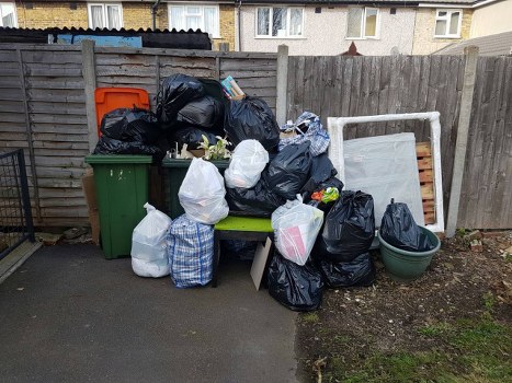 Waste collection trucks in Kentishtown streets